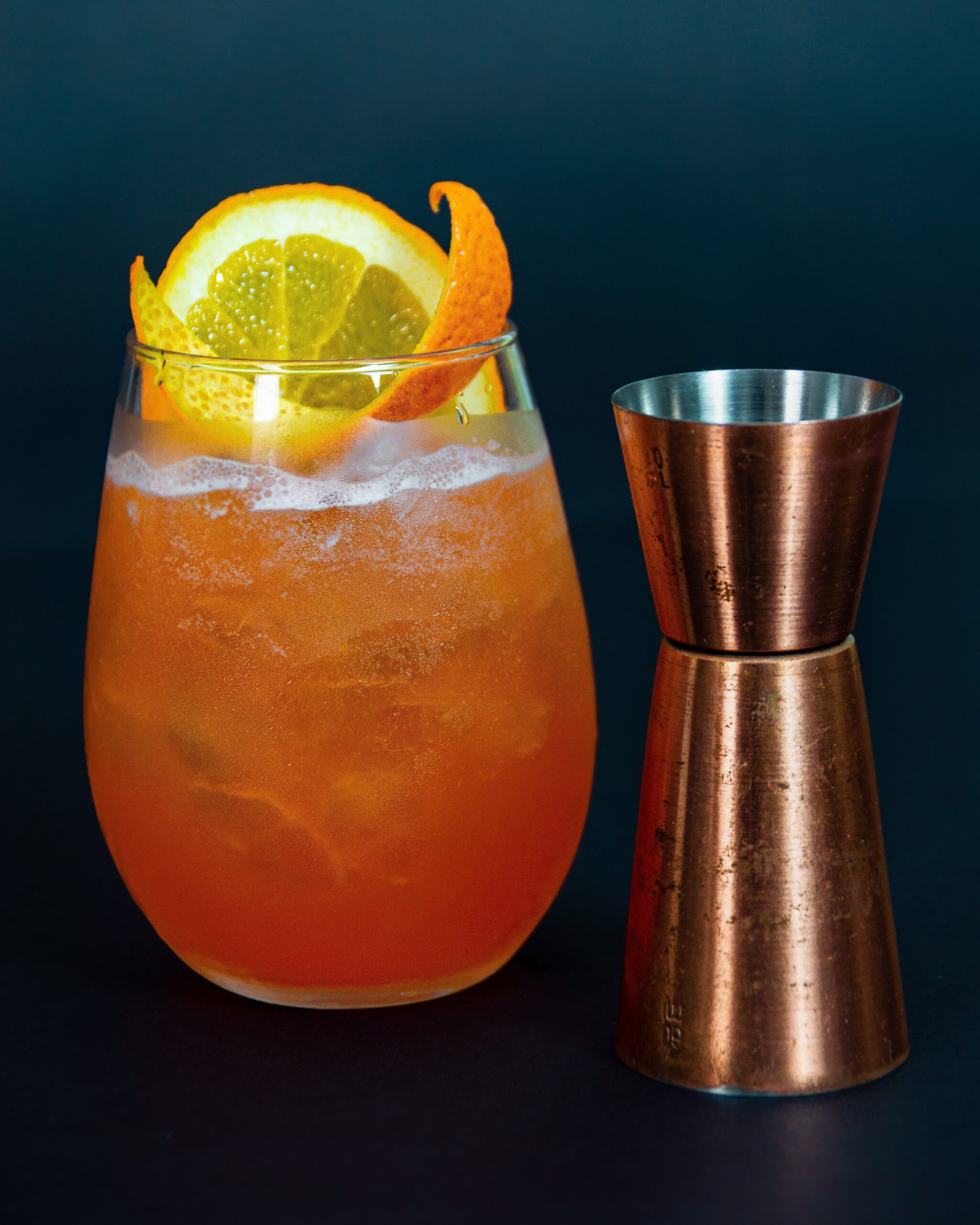 Cocktail Garnished with Orange