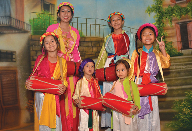 Members of the Hoang Anh dance group celebrate Vietnamese New Year.