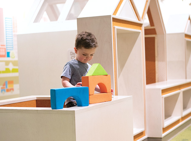 A child plays with blocks in the play area at Ridgedale Center.
