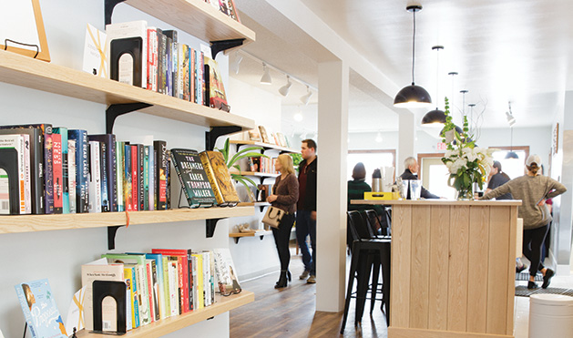 The bookshelves and bar at Cream & Amber, a new bookstore/taproom/coffee shop in Hopkins.