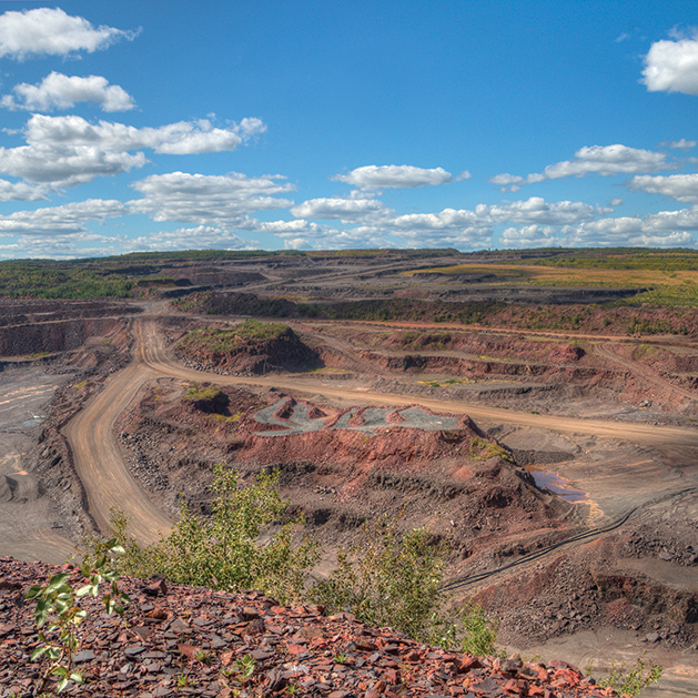 Hibbing, Minnesota has one of the largest open pit mines.