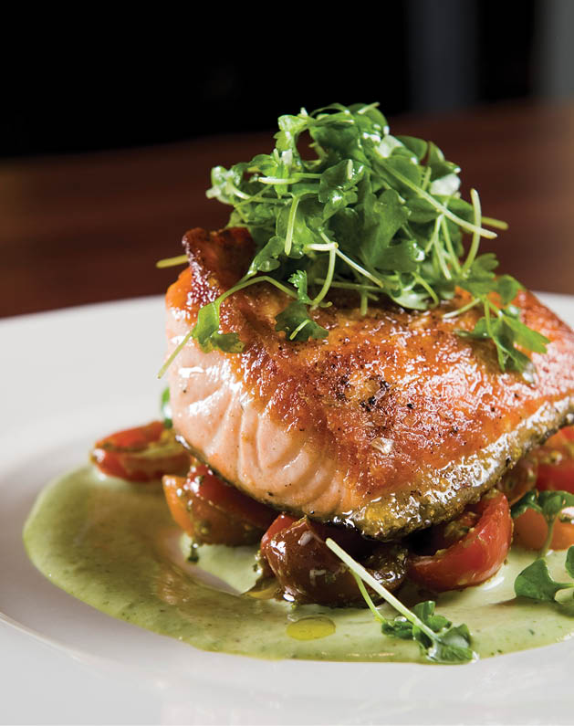 (CōV serves up fresh, seasonal fare all year round, including this springy pan-seared salmon; Photo By Emily J. Davis)