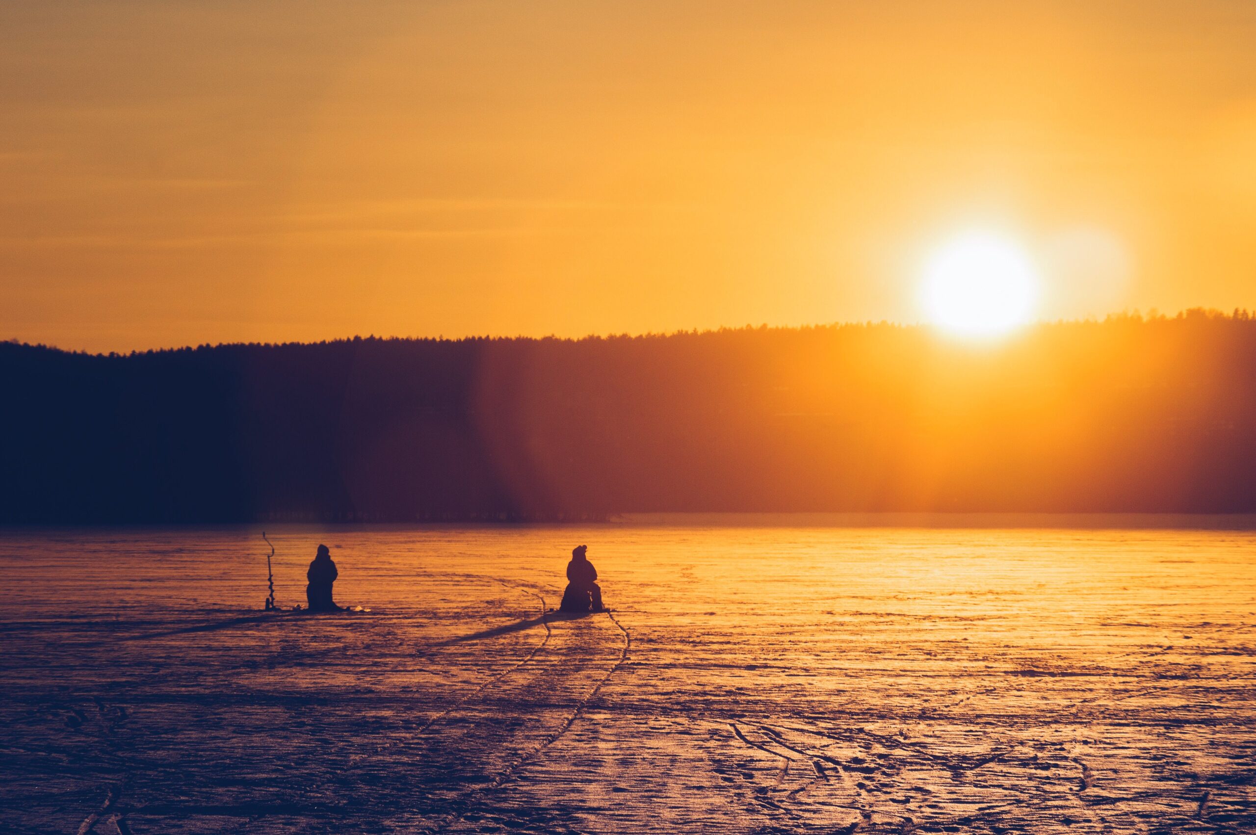 Ice Fishing at Sunset