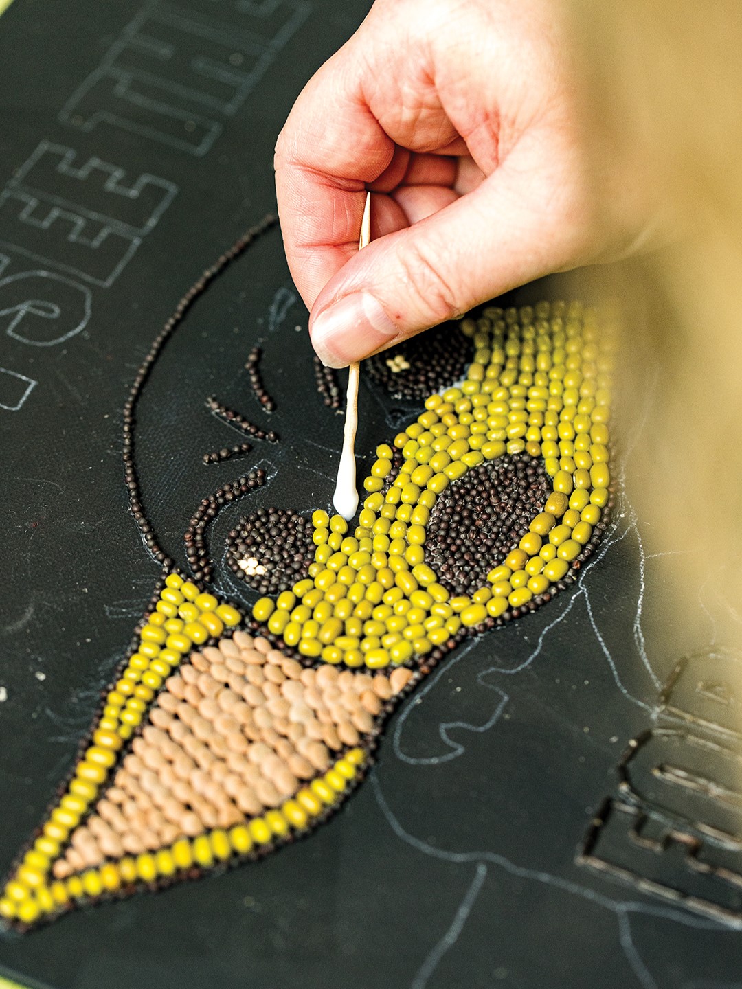 A steady hand is valuable as Laura Minnihan works on one of her pieces she hopes to showcase this year. 