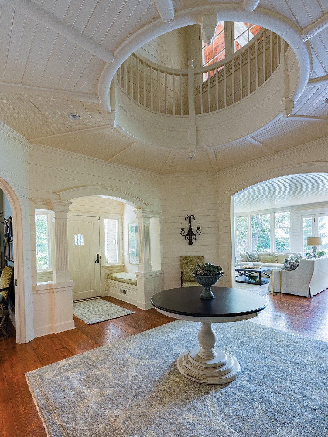 The entryway doubles as the Gartners’ dining space, which offers views of Lake Minnetonka and punctuates the home’s character.