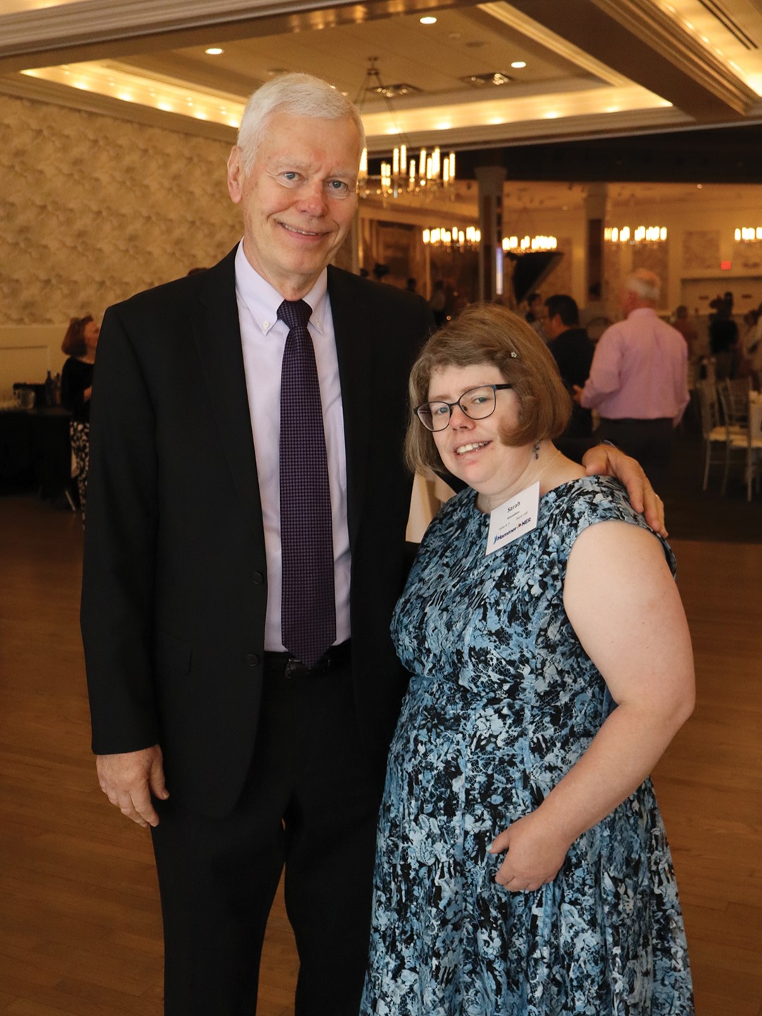 Man and woman at the Hammer & NER Reach for Ralph Fundraiser