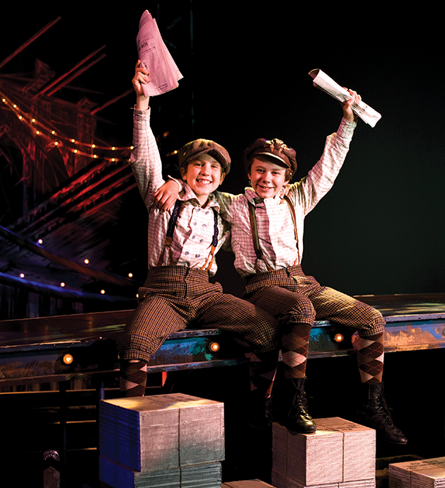 Tanner Zahn Hagen and Jon-Erik Chamberlain as newsies in the Chanhassen Dinner Theatres production of Newsies.