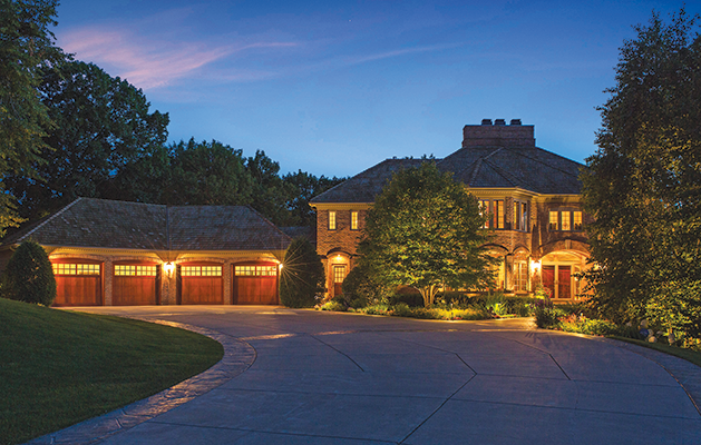 Well-lit house by Erickson Outdoor Lighting
