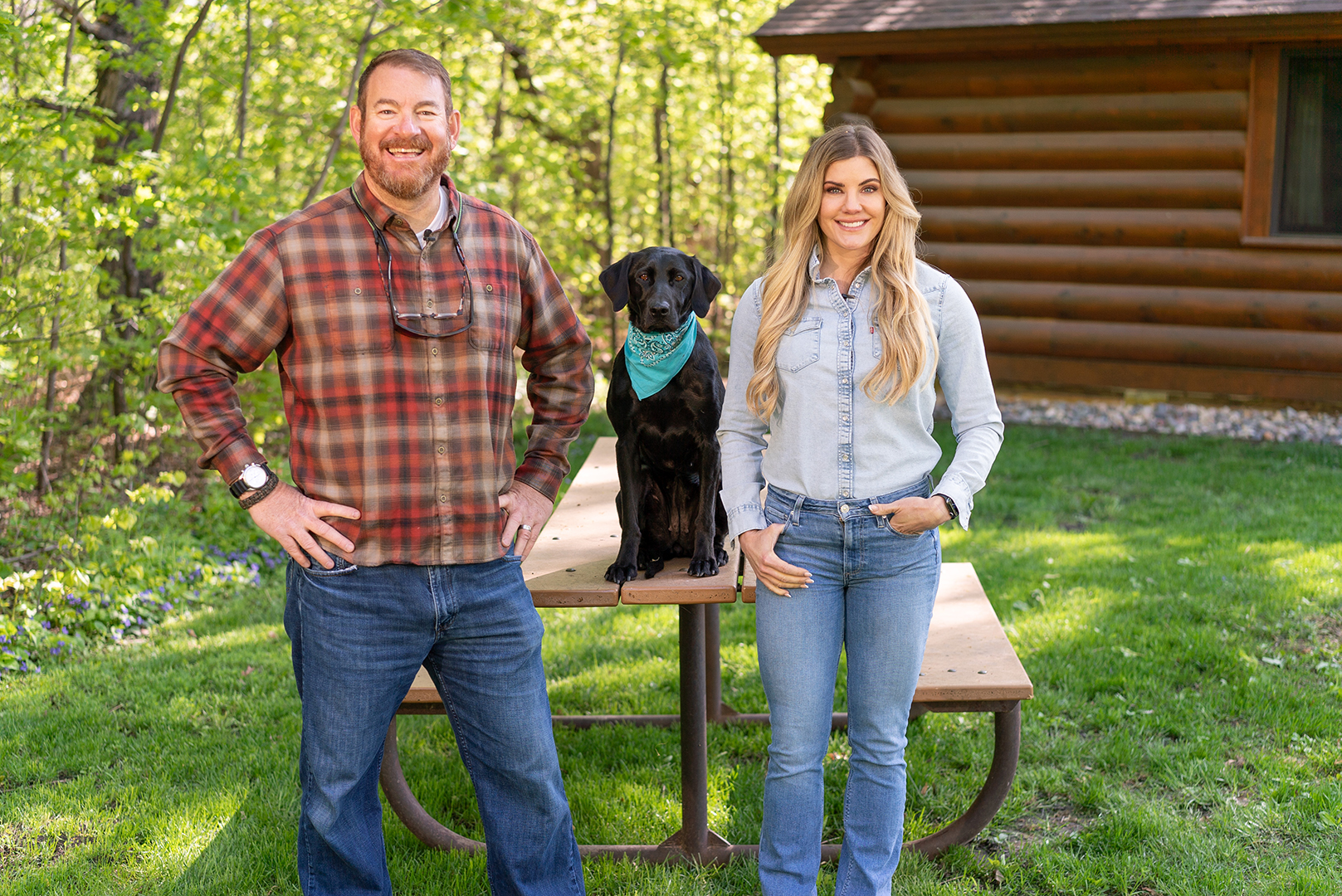 Minnesota Bound co-hosts Bill Sherck and Laura Schara with black lab Millie.