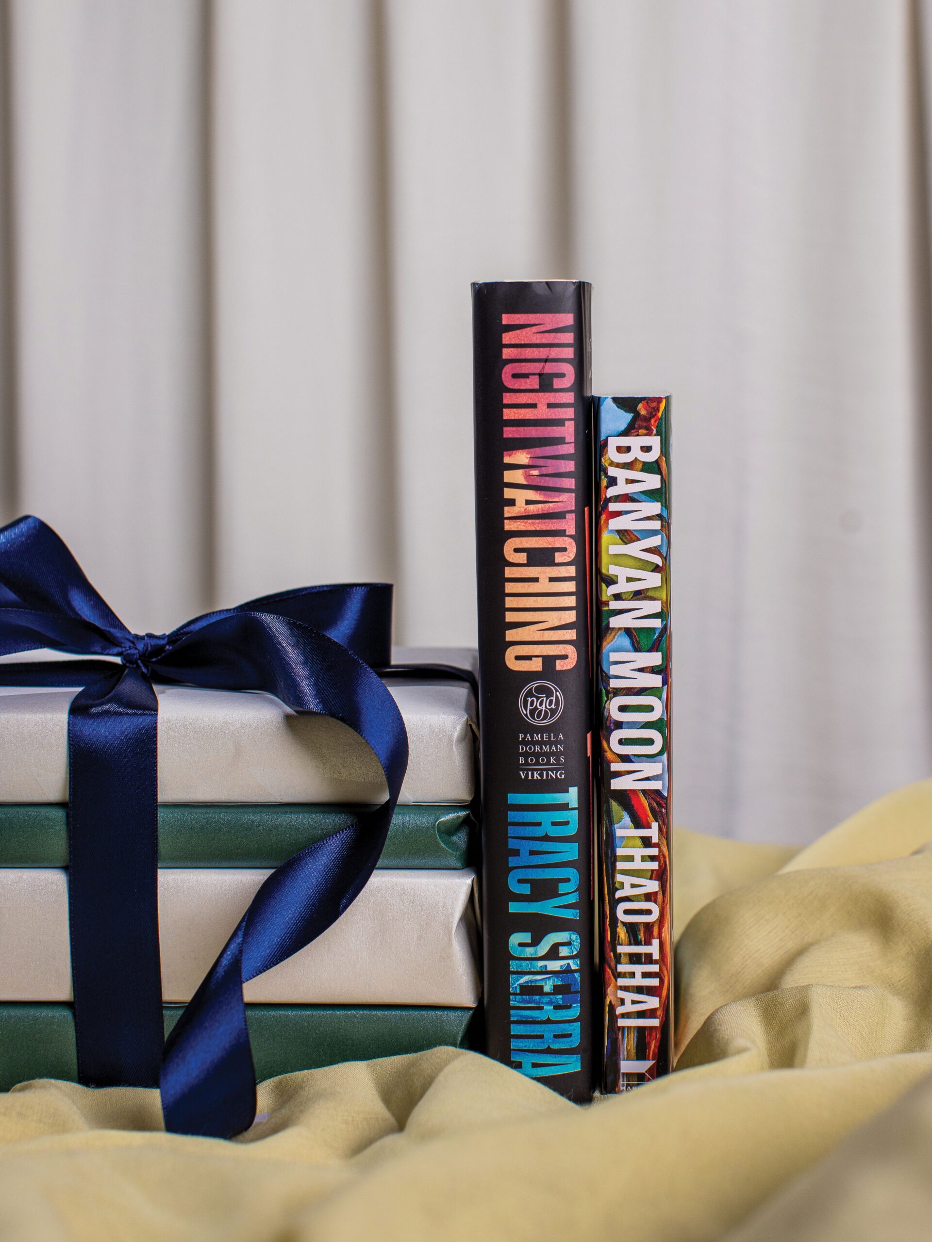 Books wrapped up as Christmas presents.