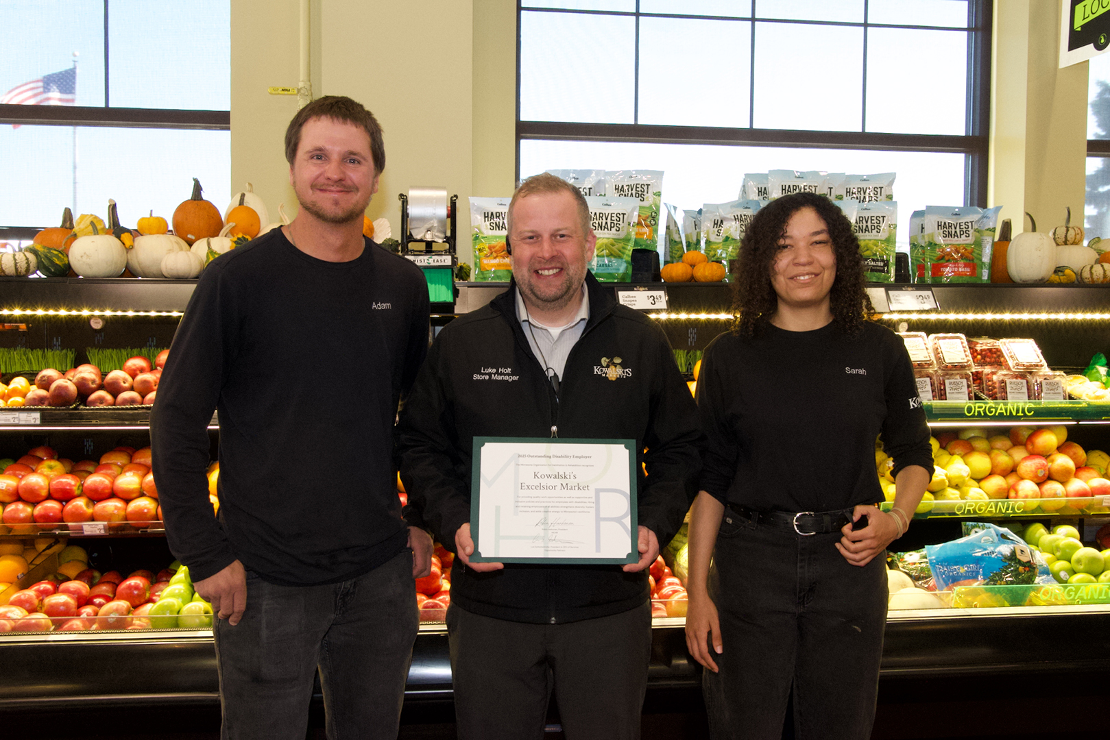 (Left to right) Adam Magnuson, Luke Holt, and Sarah Walker-Lange of Kowalski’s Excelsior Market.