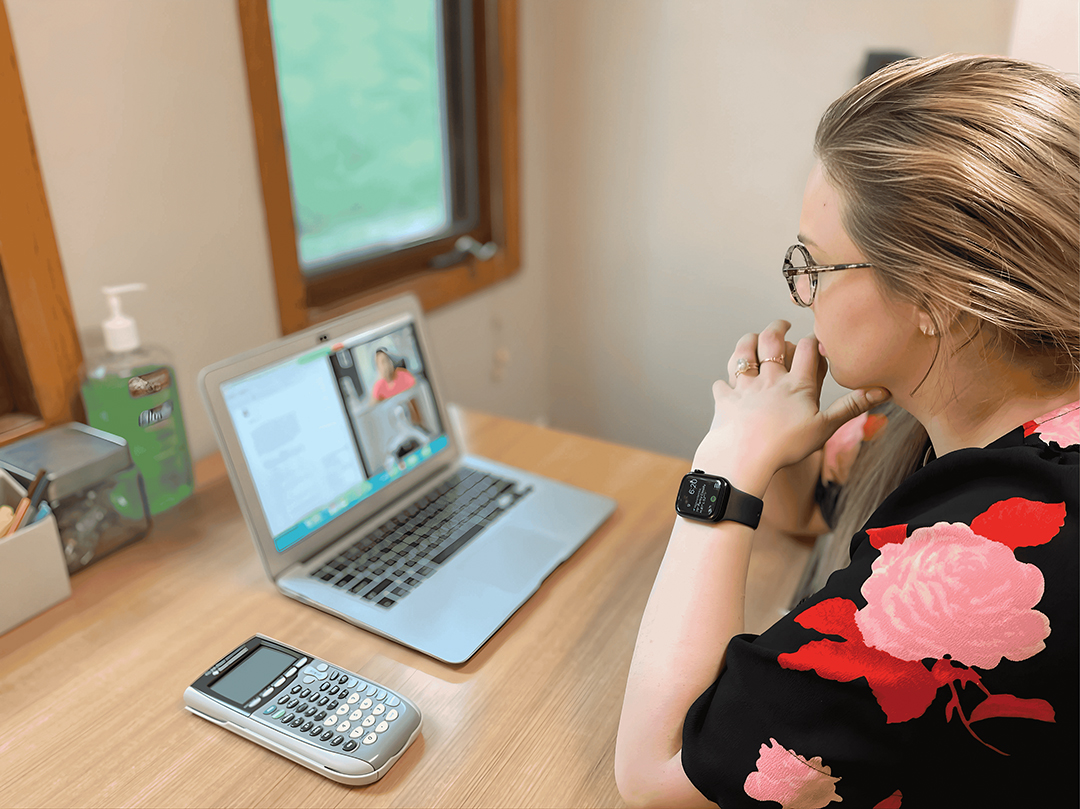 “Our tutors are doing real meaningful work and have a lasting impact on a lot of lives,” says Andrea Kay McFarland, founder of Kay Tutoring. Here, a tutor connects with a student during an online session.