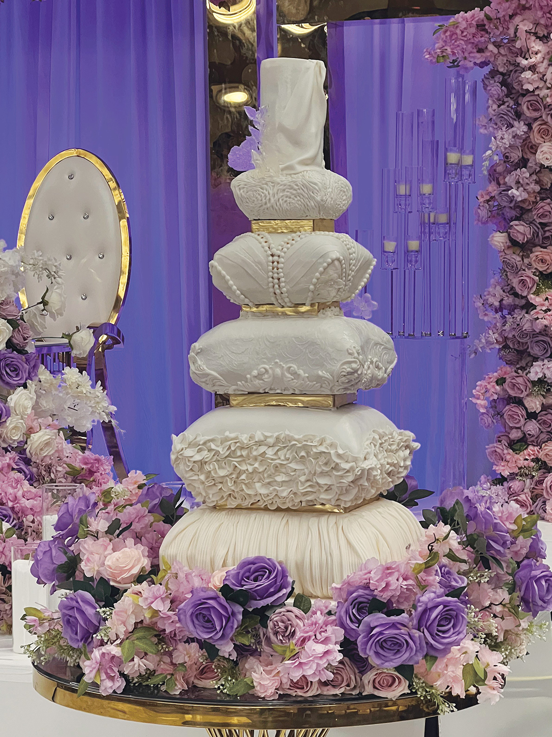 n area couple’s cake served as a particularly challenging but rewarding feat. The design consisted of six tiers of pillow replicas, stacked one on top of the other, each with its own cake flavor. “That, to me, was one of my favorite cakes to make because it actually tested me; I hand carved those pillows,” Altreisha Foster says.