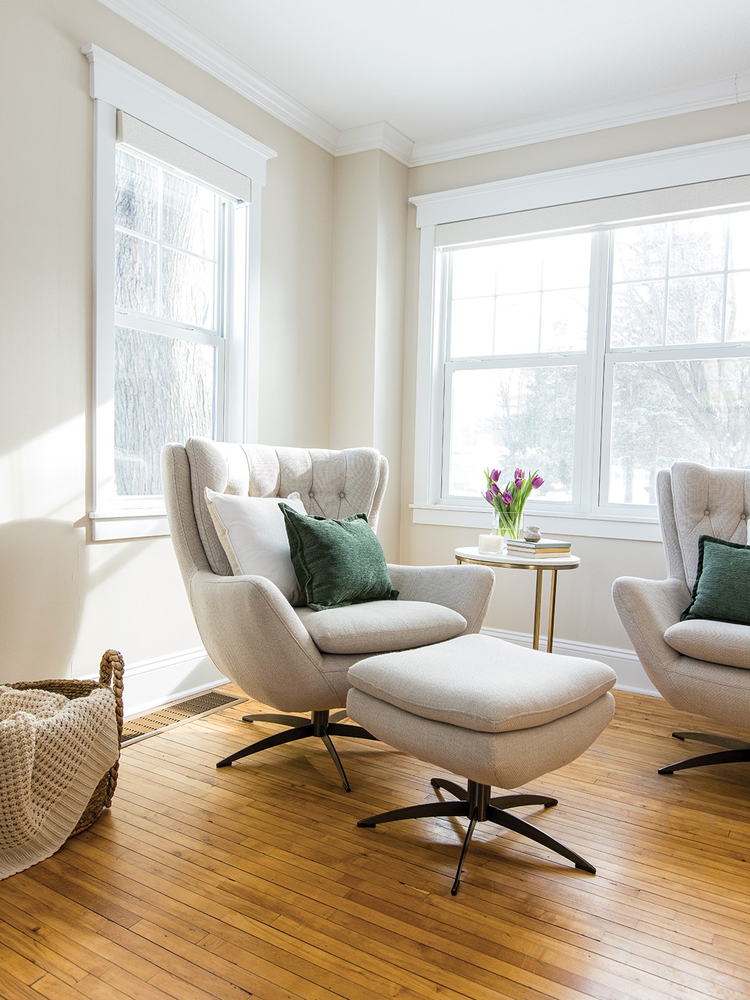 A small landing holds an extra sleeping nook for overflow guests, and the main bedroom features fresh paint, carpet, trim and the kind of detail that completes the home’s story—some adorable crystal doorknobs. Original hardwood floors remain in the front living room, now warmed by a new electric fireplace. 