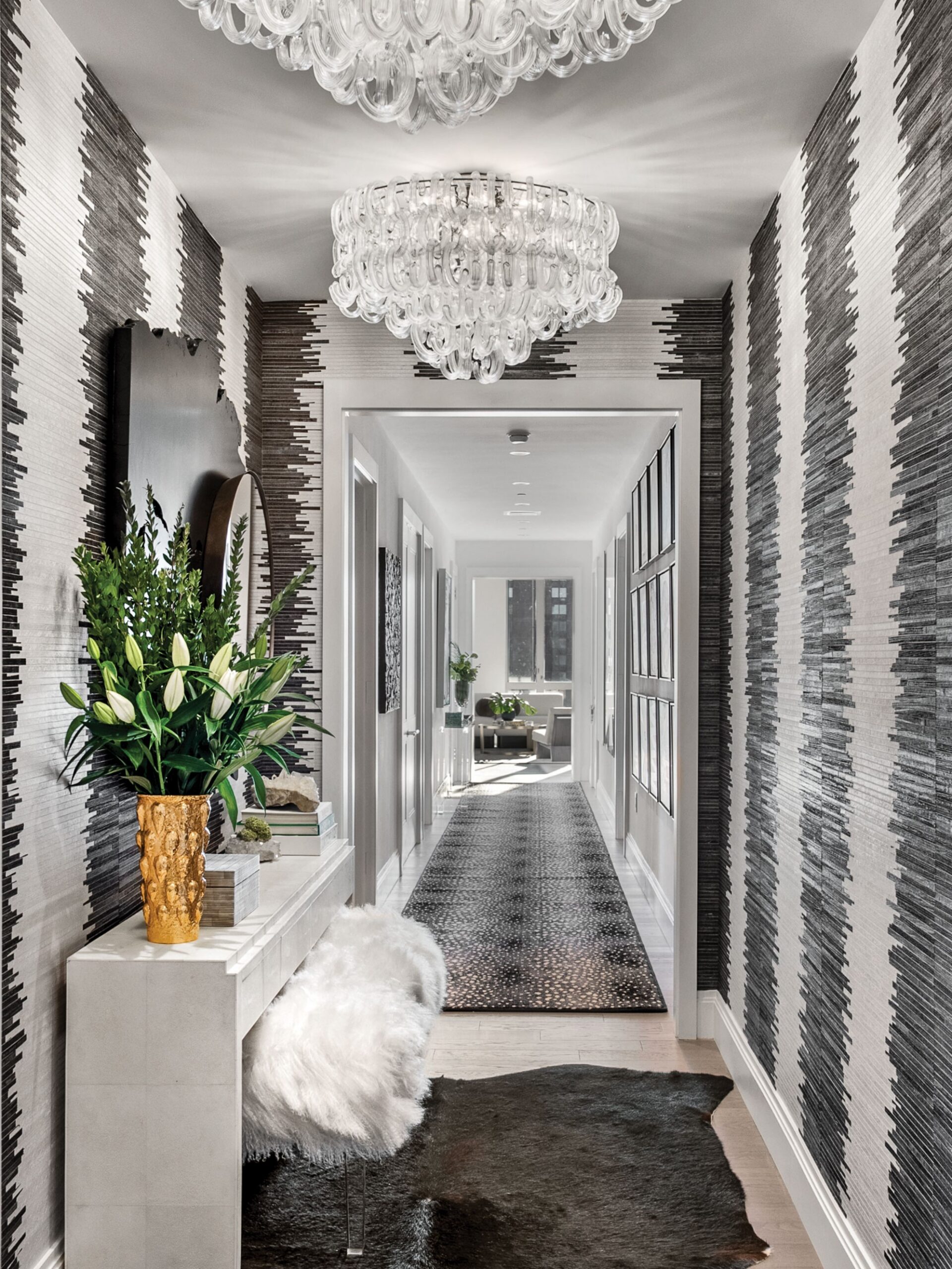 Hallway with black and white wallpaper
