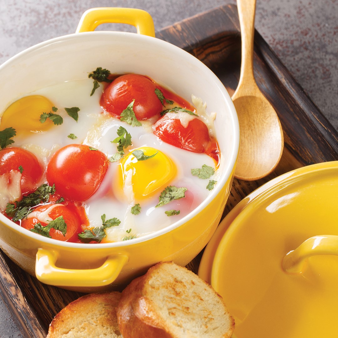“Baked eggs are the perfect place for fresh herbs because the flavors of the herbs bloom when sprinkled over the hot eggs,” Michele Phillips says. ”Herbs are more than just a garnish.” She recommends using 1–2 Tbsp. of room-temperature topping per egg, suggesting Boursin, feta or goat cheese; or finely chopped or sliced vegetables, roasted or sauteed.