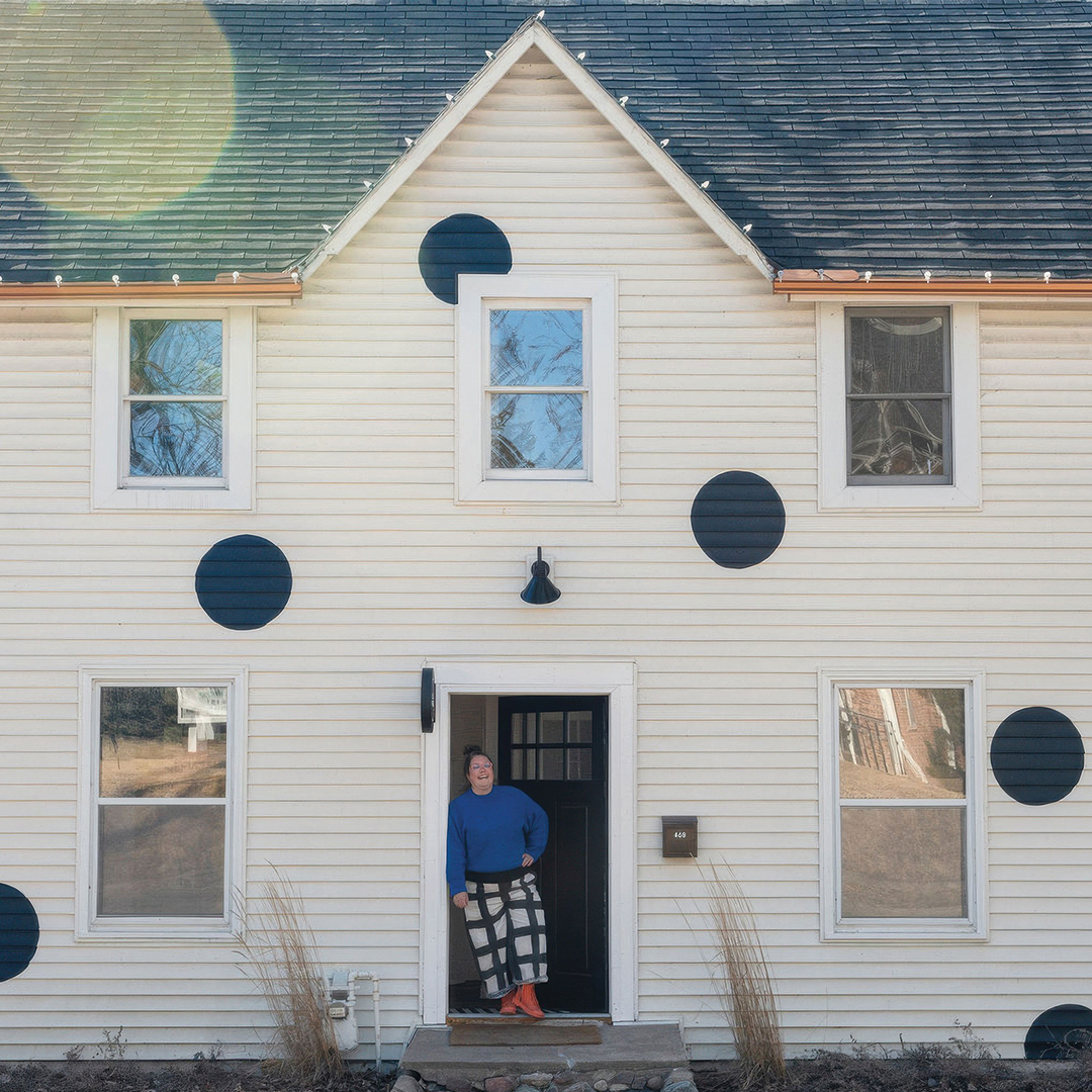  Kelly Carámbula hand painted polka dots, which hold meaning to her, on the exterior of the Excelsior site that is home to her studio, two galleries and public creative spaces.