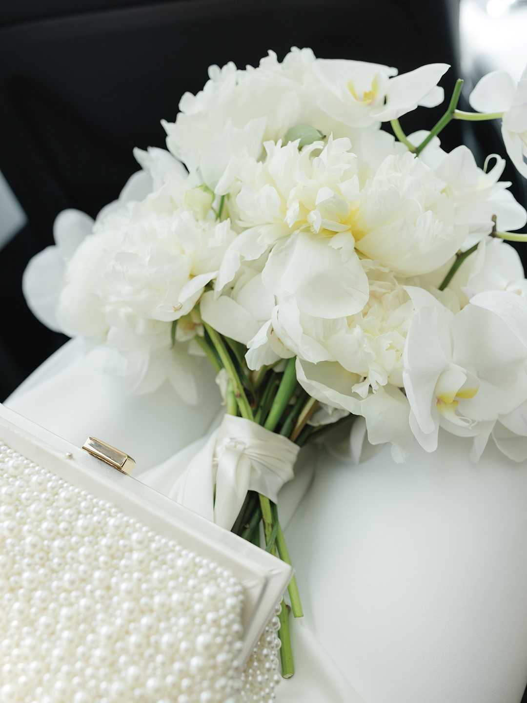 Wedding bouquet and bridal purse