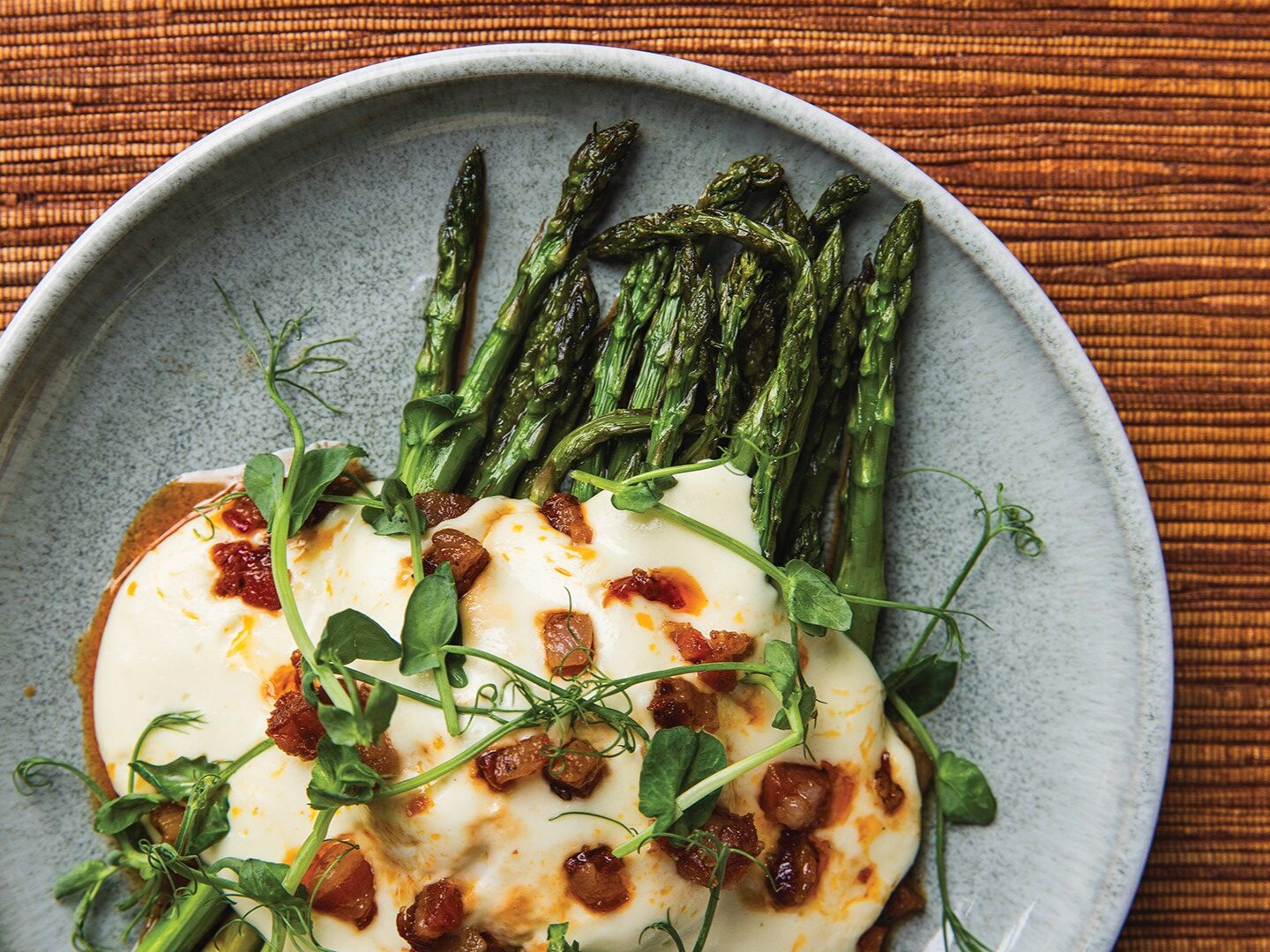  Asparagus with pancetta, Gruyére fonduta, lemon and herb oil serves as an inspired side dish.