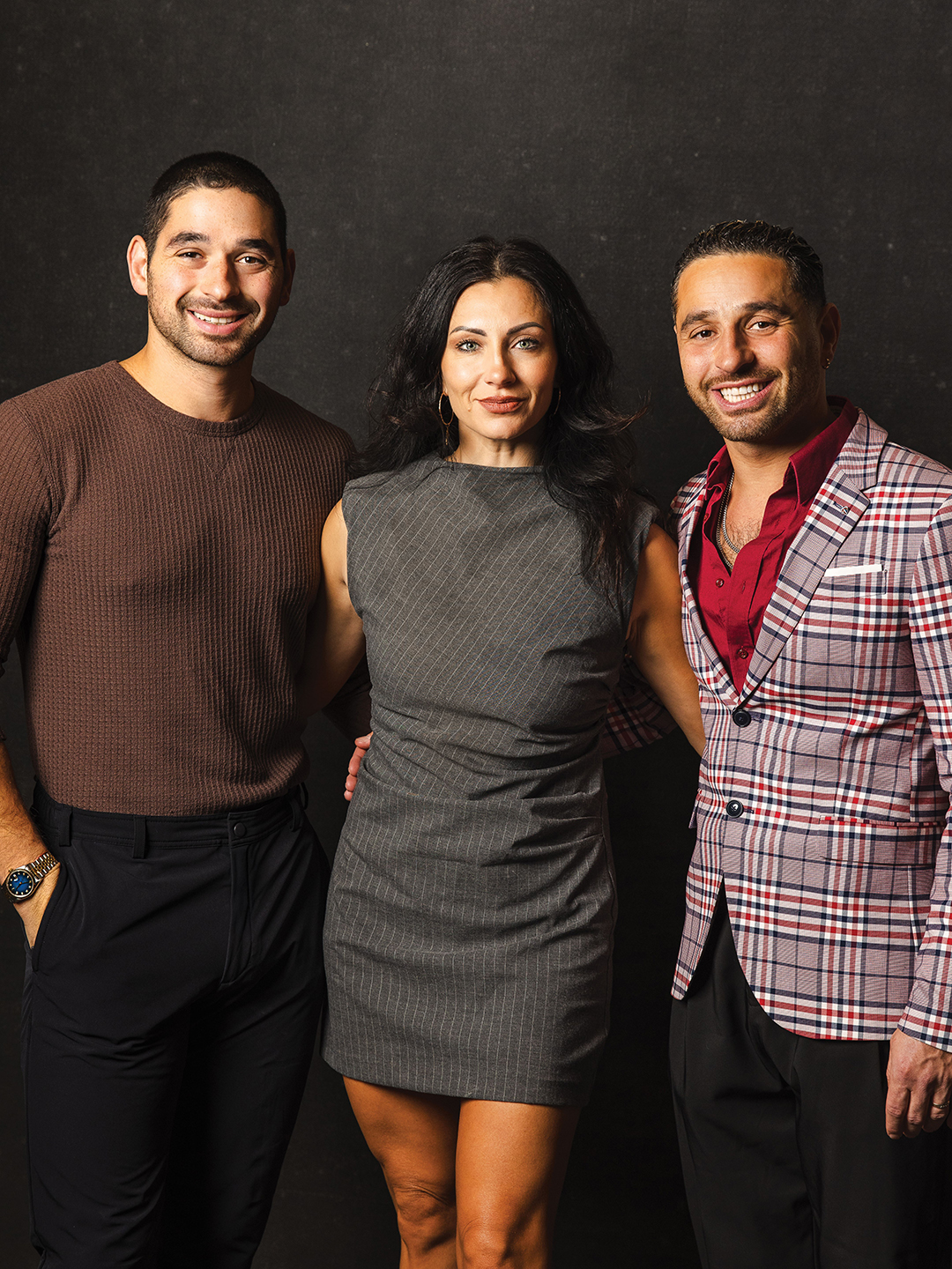 The family that dances together stays together. Alan Bersten and his sister-in-law and brother, Elena and Gene Bersten, share a quiet moment during downtime at Snow Ball, their annual international ballroom dancing competition in Minneapolis. 
