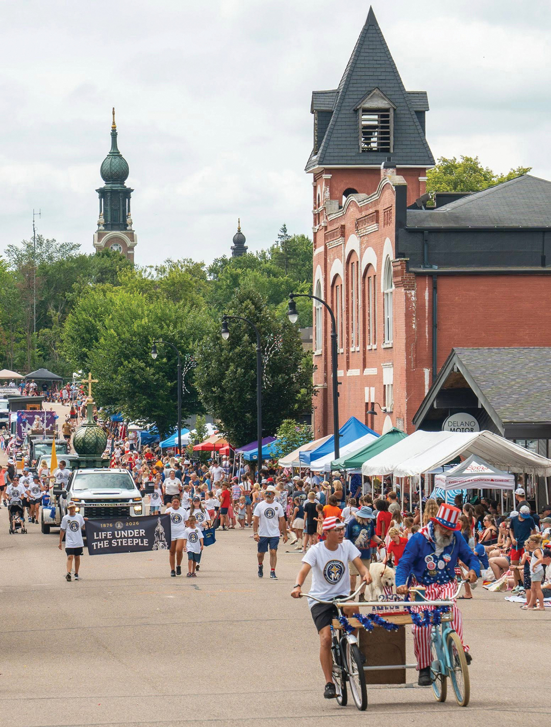 Downtown Delano spills over with parade-goers during this year’s Fourth of July Celebration.